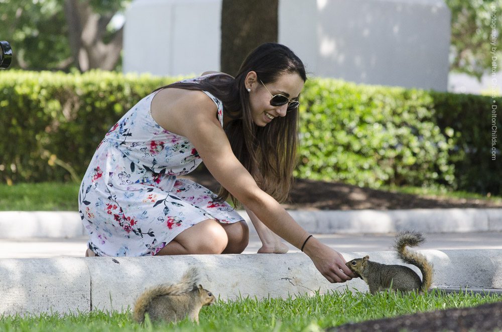 Woman Feeding Squirrel at the Texas State Capitol