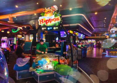 SuperNova Employees Playing Hungry Hungry Hippos at Dave & Busters.